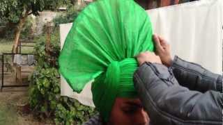 HOW TO TIE BHANGRA TURBAN RIFAC INDIA Rhythms International Folk Art Club [upl. by Ellerol]