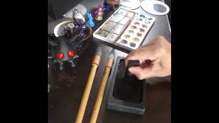 Grinding ink on an inkstone for calligraphy [upl. by Ralfston]