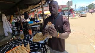 Street food Eating most delicious pizza in Uganda [upl. by Asselam]