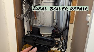 Ideal Logic combi boiler Replacing a split sump and cover [upl. by Kessel690]