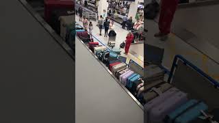 Baggage carousel chaos suitcases spill in Manchester Airport [upl. by Hailey378]