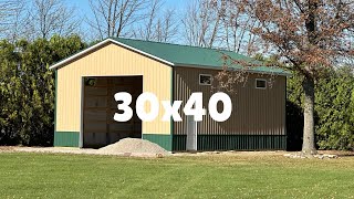 Building a 30x40 pole barn building  with 3 ply posts on top of concrete [upl. by Saihttam448]