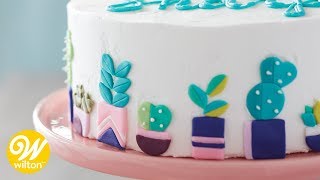 How to Inlay Fondant using CutOuts  Wilton [upl. by Joslyn]