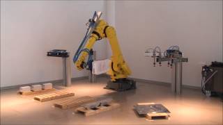 Palletizing robot in Vuototecnica showroom [upl. by Ycnuahc]