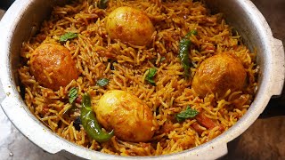 Egg biryani in pressure cookerBachelors Recipe Quick Egg Biryani [upl. by Selda]