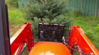 Danuser Intimidator on Kubota M7060  Proper tree pulling technique [upl. by Wagstaff]