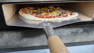 Perfect pizza every time with the BakerStone BBQ top pizza oven [upl. by Oetomit]