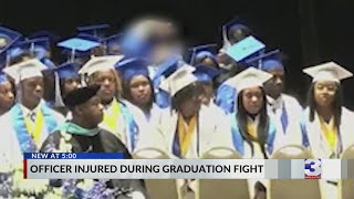 Fight breaks out at high school graduation [upl. by Wolfort384]