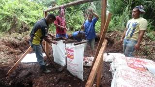 Singaporean volunteers dig deep in Sumatra to combat haze [upl. by Cobbie]