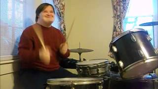 Young man with Down Syndrome plays drum set for the first time [upl. by Alikam]