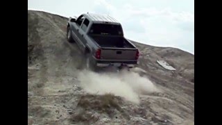 2006 Chevy Silverado Z71 hill climb 2WD vs 4WD [upl. by Ahsienak395]