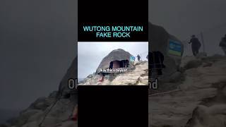 Fake giant rock atop a mountain in China [upl. by Nanreit]