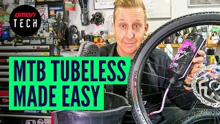 How To Convert Your MTB Wheels To Tubeless  Mountain Bike Tubeless Setup [upl. by Kentigerma]