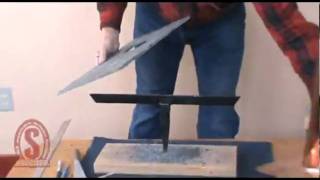 Cutting a hole in slate to match a vent pipe [upl. by Noitsirhc]