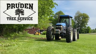 Gyro Trac Tree Clearing with New Holland TV140 Bidirectional Tractor [upl. by Llekram]