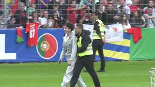 Fans invade pitch to take selfies with Ronaldo during Portugals first open training session [upl. by Anwadal]