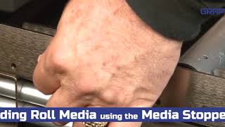 How to load roll media using the media stopper on the Graphtec FC8600 [upl. by Levram973]