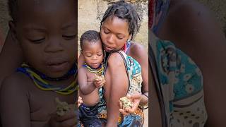 See Hadzabe Tribe Woman Feed Her Kid With BushMeat hadzabetribe shortsfeed [upl. by Azenav]