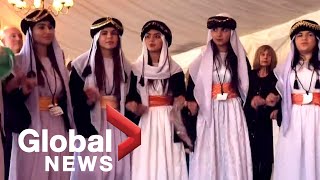 Yazidi womens choir that fled Iraq performs in UK [upl. by Lerrehs]