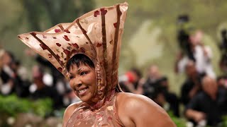 Lizzo shocks in coneshaped head piece for 2024 Met Gala  NBC New York [upl. by Assiren]