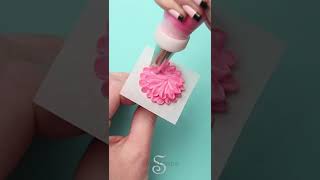 Piping a royal icing flower [upl. by Roslyn417]