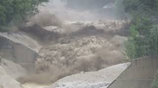 Violent Debris Flow Crashes Down Swiss Alps After Heavy Rainfall [upl. by Angelia]