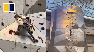 Fearless little Chinese girl climbs 50m wall in mall [upl. by Tada]