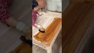 The process of brushing wood wax oil on wood table [upl. by Eckel]