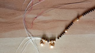 Short mangalsutra design24 how to make black beaded mangalsutra at home [upl. by Arahsat217]