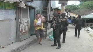 Philippines Residents clash with demolition team [upl. by Darrelle662]