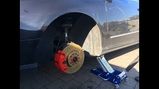 Passat B6 Change Front DiscsRotors Pads and paint caliper [upl. by Ecinrahs]