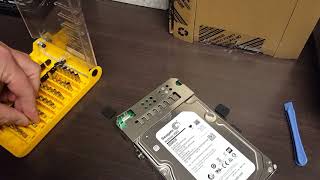 How to Disassemble A Seagate Backup Plus External Disk Chassis [upl. by Richela157]