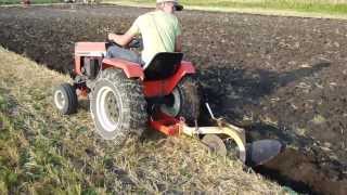 Case 448 Garden Tractor pulling a 10quot Brinly Moldboard plow [upl. by Hinkel850]