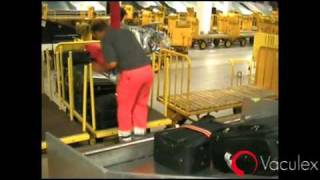 Loading Baggage from Chute to Open Cart  using Vaculex TP BaggageLift [upl. by Lebyram]