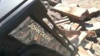 Dumping concrete with a John Deere Gator XUV [upl. by Eillime]