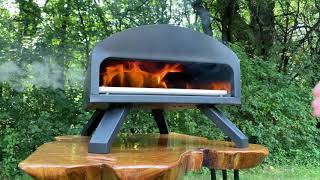 Bertello Outdoor Pizza Oven  Using Wood and Charcoal [upl. by Aiyot199]