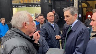 Simon Harris confronts heckler who told Taoiseach he should be ashamed of himself [upl. by Lomaj]