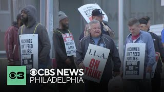 Dockworkers hit the picket line in Philadelphia as port strike starts along the East and Gulf coasts [upl. by Ardnazxela]