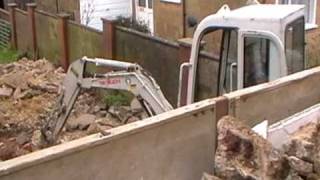 Takeuchi TB016 Loading Lorry with Rubble [upl. by Janeen]