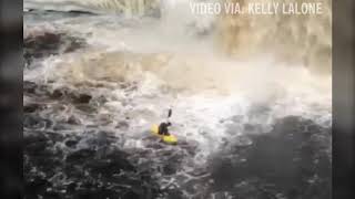 Kayaker paddles over Michigans Tahquamenon Falls [upl. by Lienhard]