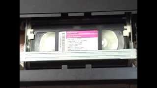 Sony SLVN51 fastforwardrewind cycle of a short VHS cassette with oversized hubs [upl. by Snilloc685]