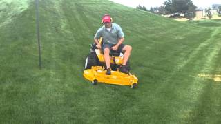 Walker zeroturn mower effortlessly mowing on 25 degree slope [upl. by Kiehl586]