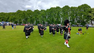 Drum Major Rennie leading Kintore Pipe Band on the march during 2024 Oldmeldrum Highland Games [upl. by Rother]