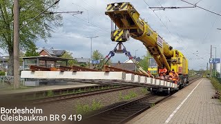 Bordesholm Vorbeifahrt STRABAG Gleisbaukran KRC 910 BR 9419 aka auf Betriebsfahrt [upl. by Corliss989]