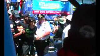 Kobayashi Arrested  Nathans hot dog eating contest [upl. by Nazus]