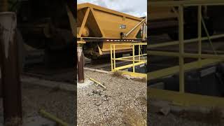 Unloading belly dump trucks at ready mix concrete plant [upl. by Aryn]