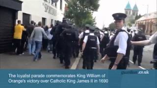 Orangemen parade through Belfasts Ardoyne district [upl. by Neelak]