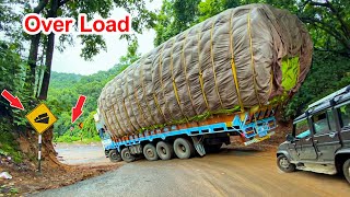 Lorry Videos  Heavy Overload Truck Dare Drive On Risky Ghat Downturns  Truck Video  Trucks in Mud [upl. by Ennovyahs947]