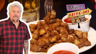 Guy Fieri Eats Chicken GIZZARDS in Michigan  Diners DriveIns and Dives  Food Network [upl. by Mckale948]