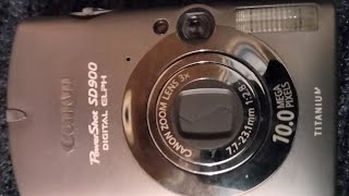 Canon PowerShot SD900 Titanium 100 vintage 2007 digital elph camera battery loading and powering on [upl. by Sakiv]